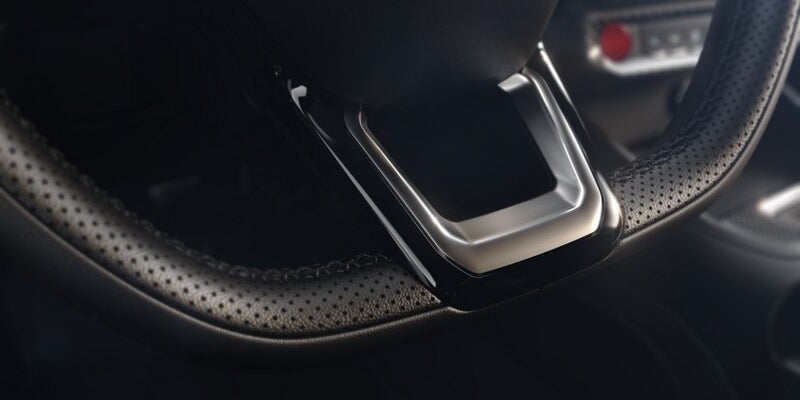 Close-up of sporty steering wheel grip