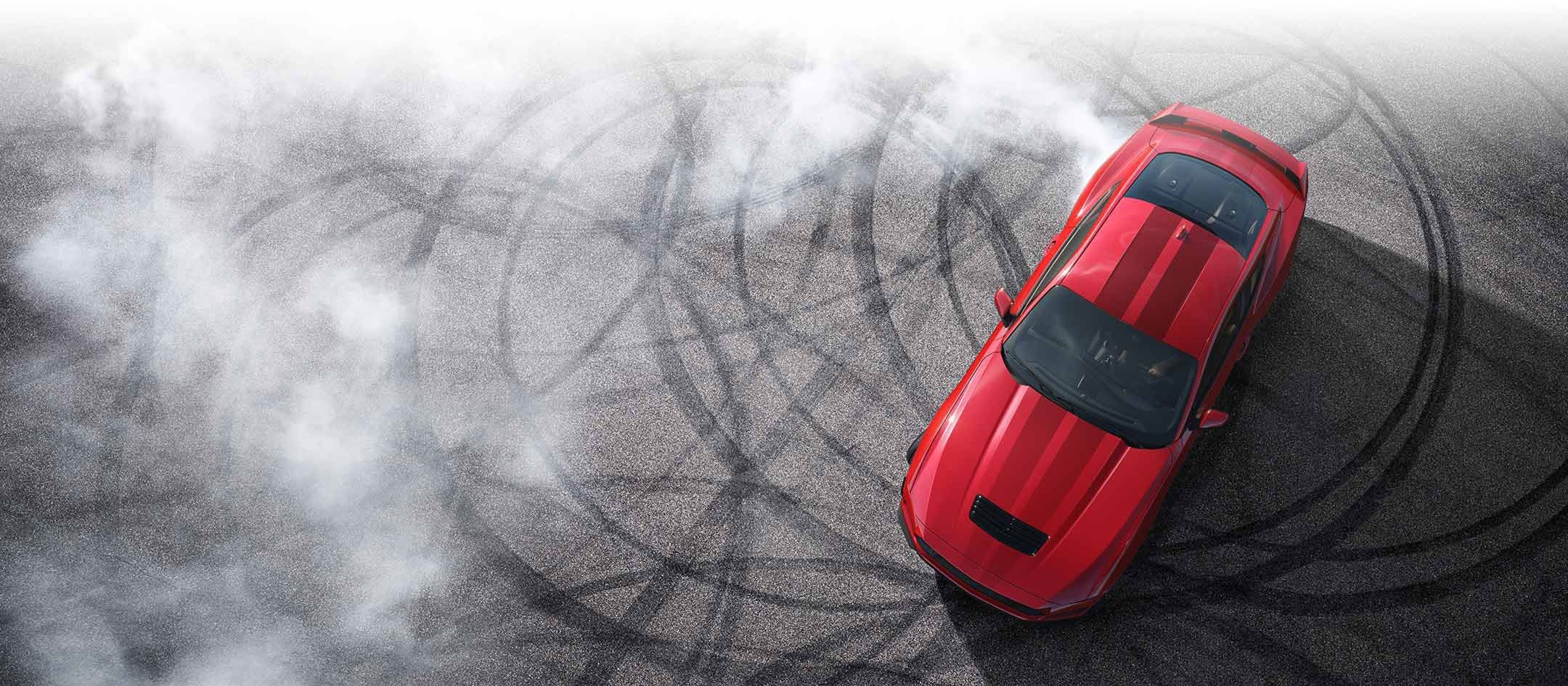 Overhead view of a 2024 Ford Mustang® model with tire tracks on pavement | Imperial Country Ford, Inc. in Imperial NE
