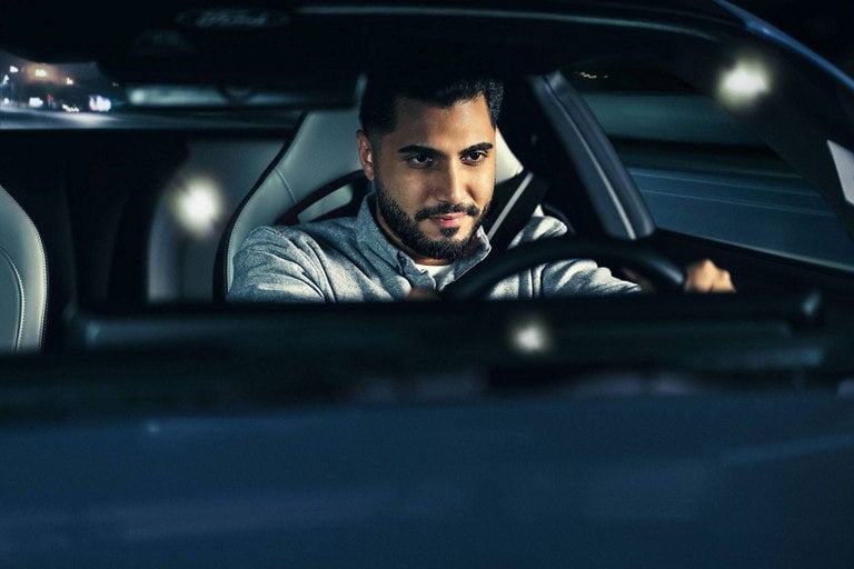Person sitting in the driver’s seat of a parked 2024 Ford Mustang® coupe | Imperial Country Ford, Inc. in Imperial NE